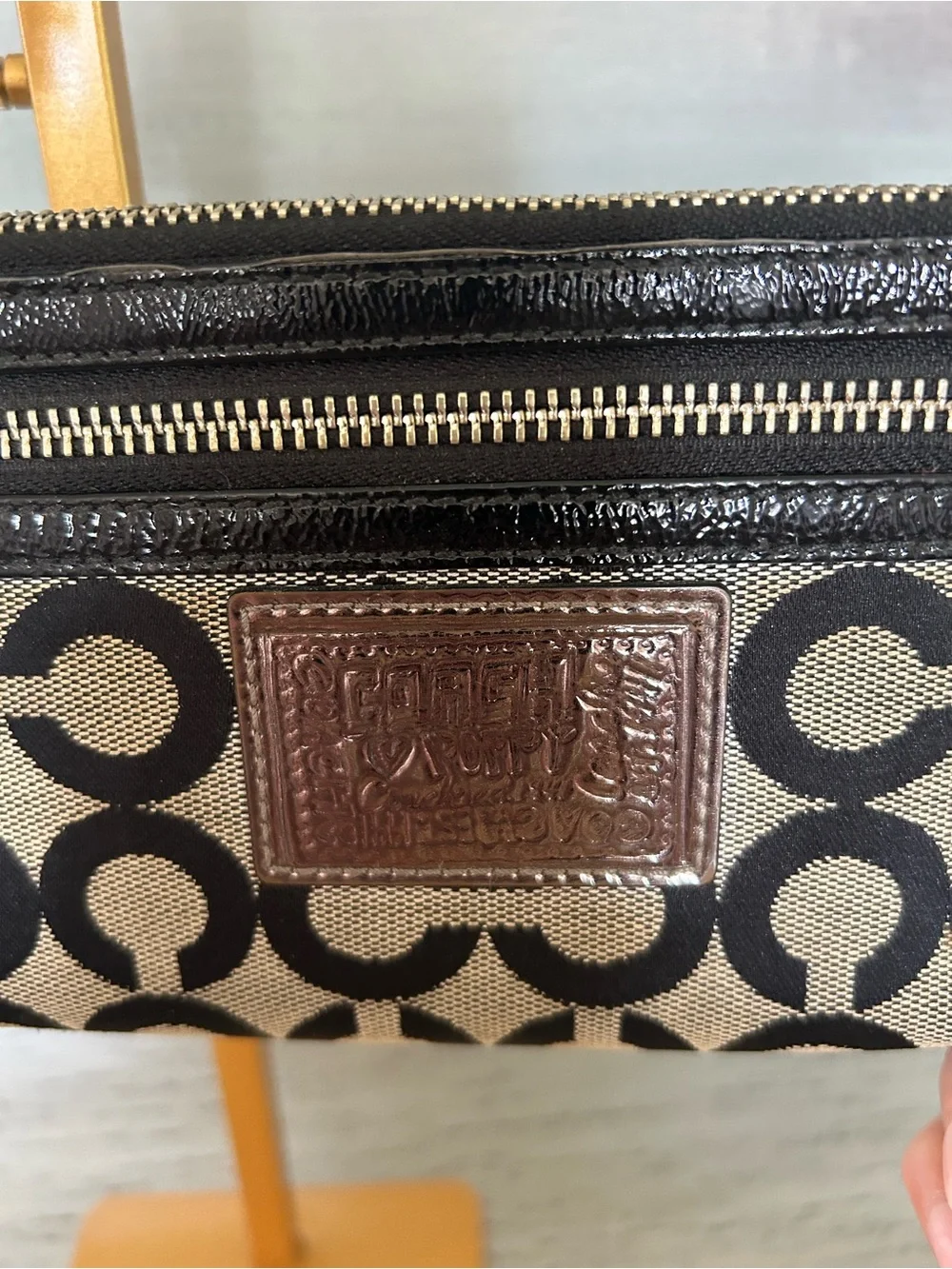 Coach Poppy Black and Cream Signature Wristlet